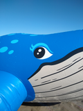 Classic 1990s inflatable blue whale ride-on