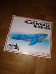 Classic 1990s inflatable blue whale ride-on